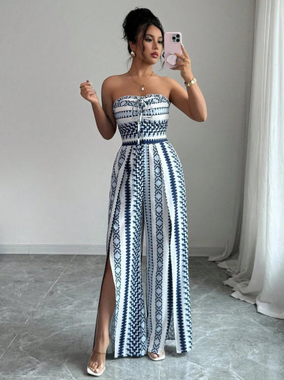 🎁Nyhet – 50 % rabatt💥 Mönstrad jumpsuit med halterneck & slits i sidan – luftig, elegant och gjord för att synas ✨