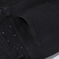 Smalpassade svarta jeans med strassdekorationer
