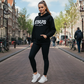 Trendig hoodie med glittrande paljetter och “JESUS is the Light“