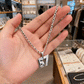Halsband med nummerpendant 67