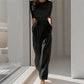 Kvinnlig jumpsuit med vida ben i enfärgad design