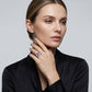 Asymmetrisk ring med marquise-slipad lila zirkon