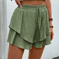 💃 Dam flödande shorts med volang-lager – kjol-liknande utseende med shorts-trygghet, resår med dragsko & andningsbart tyg, perfekt för varma dagar & strandpromenader 🏖️