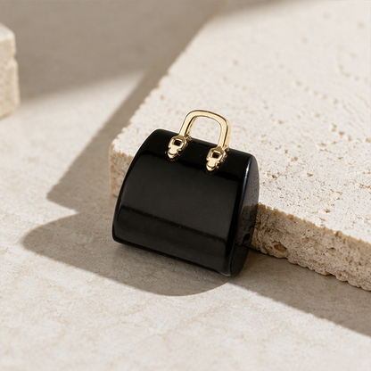 Elegant handväskprydnad i sten i miniatyr