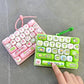 Söt tangentbordsnyckelring och fidgetleksak